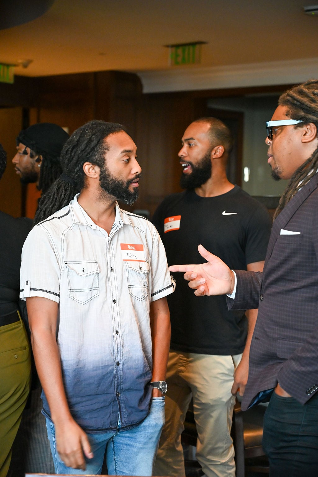 Three men at a private event