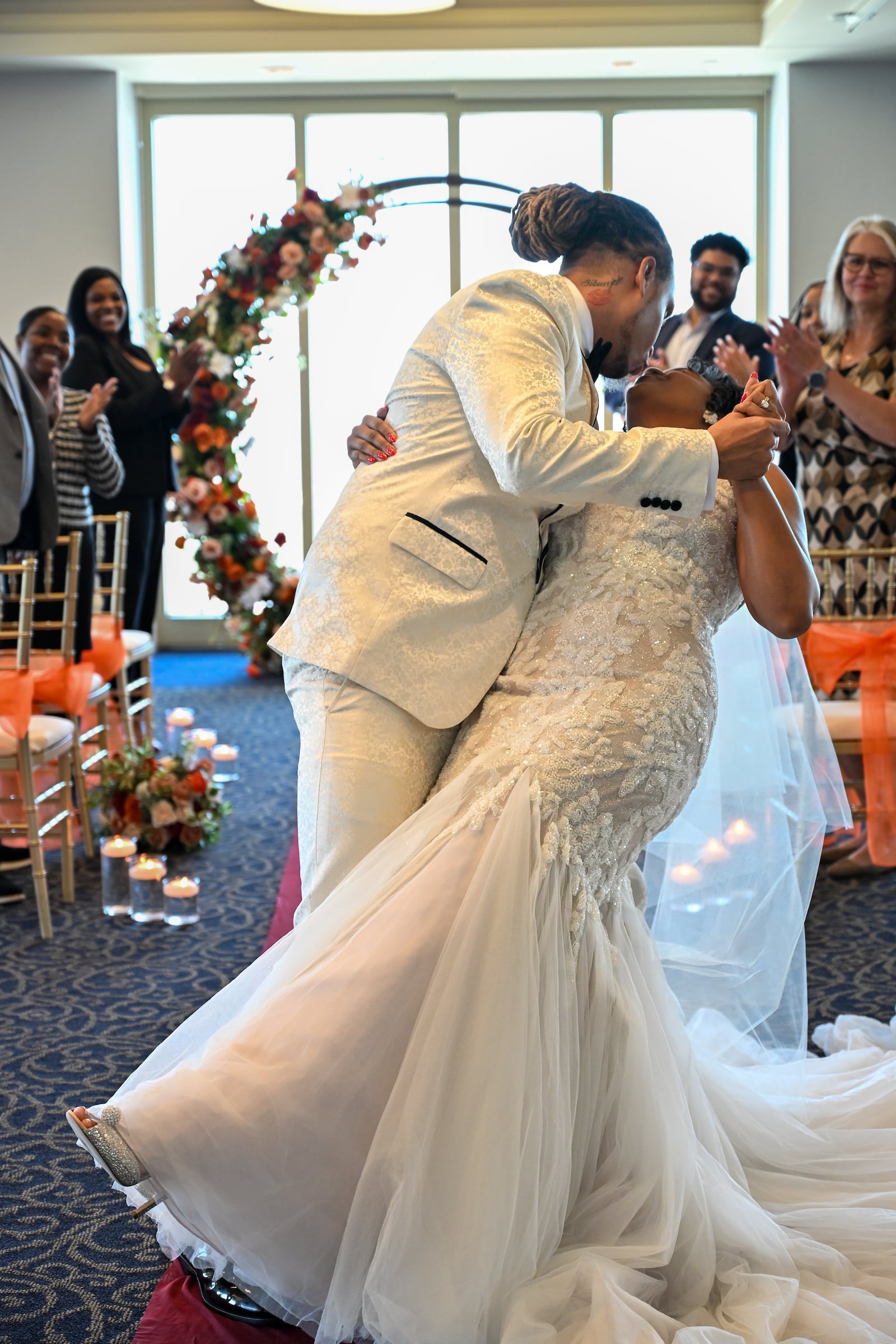 Groom dipping Bride for a kiss
