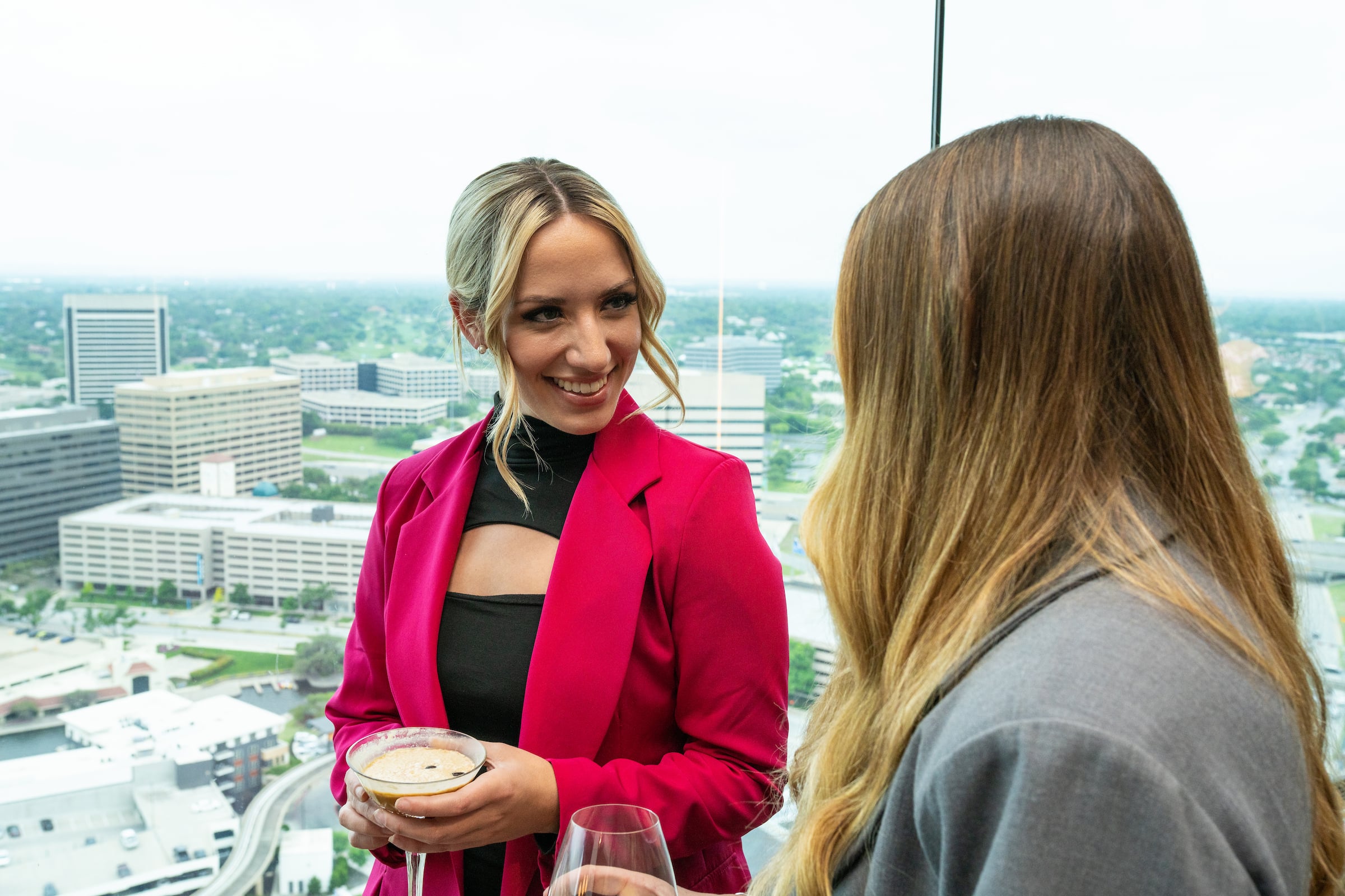Two women have a dring & talking