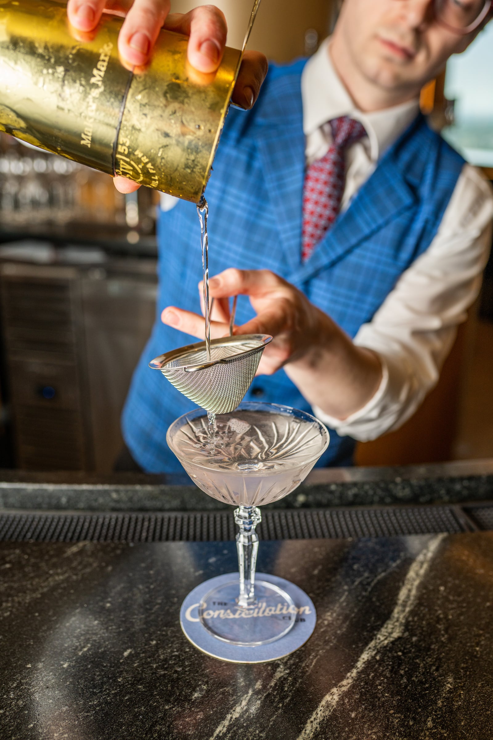 Bartender pouring a drink