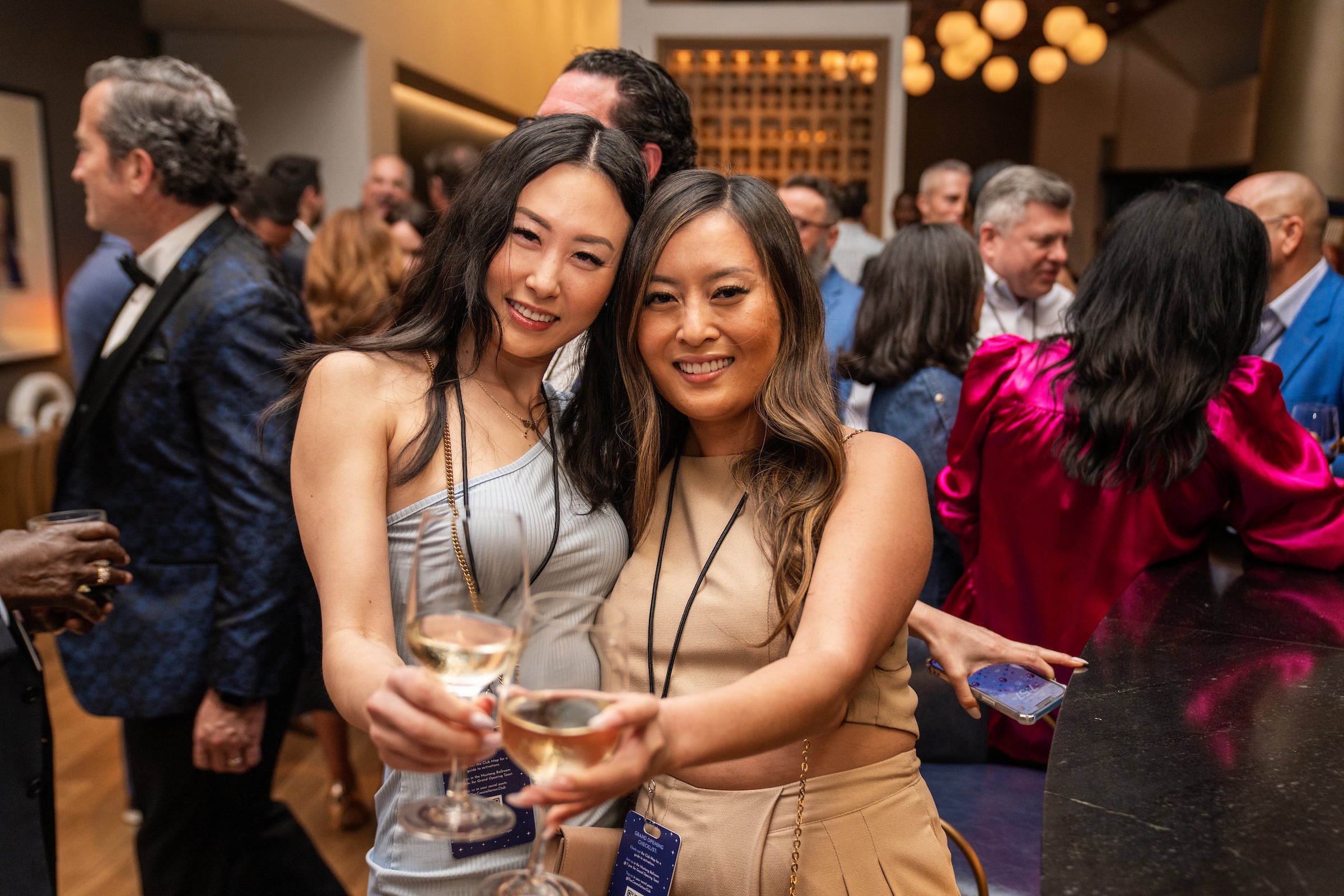Two Women toasting at a Private Event at The Constellation Club