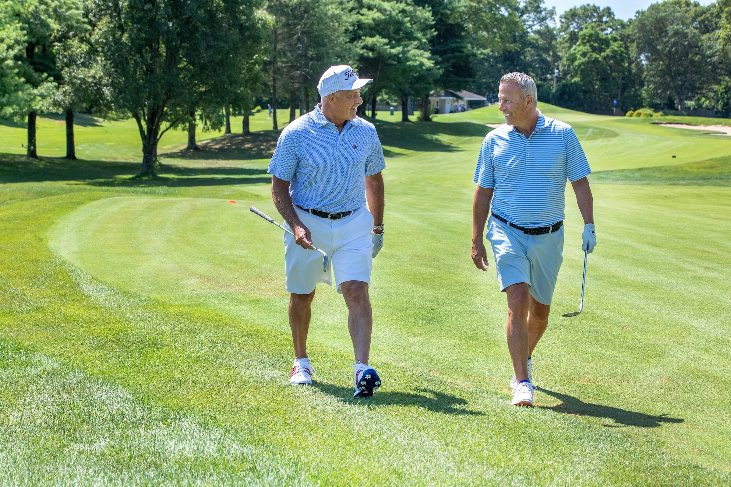 Men playing golf