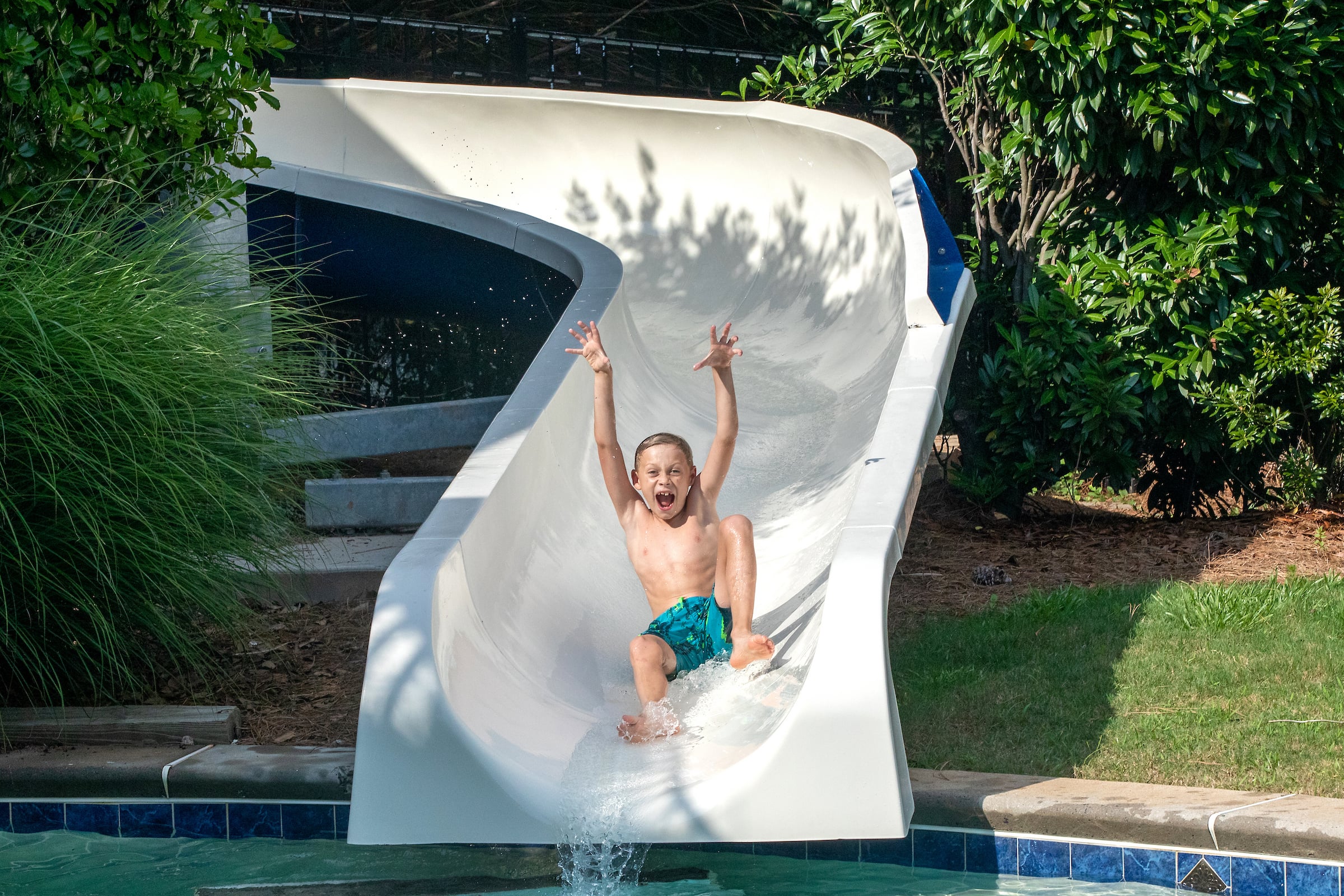 Child sliding down a waterslide