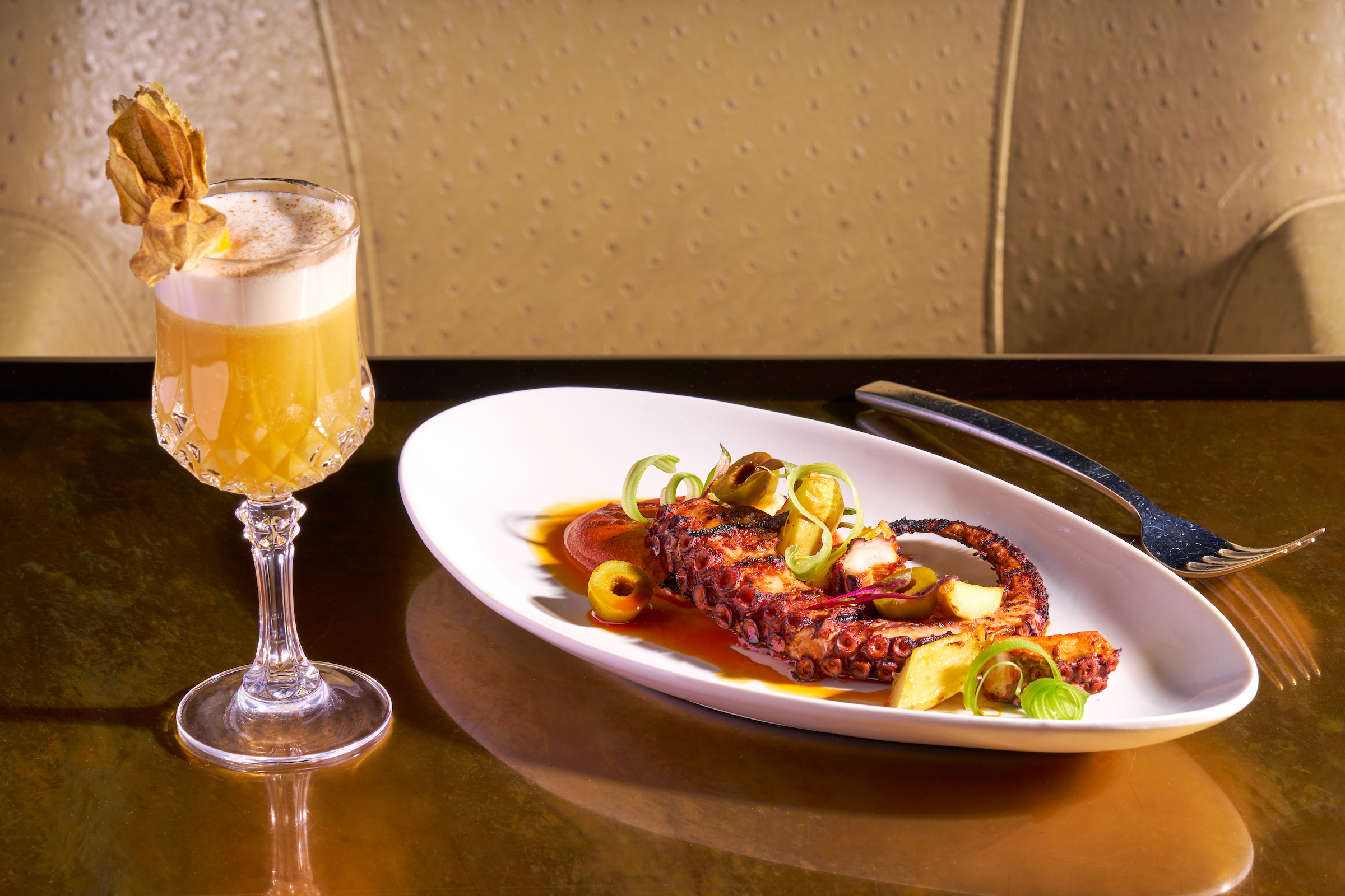 Plate of food & cocktail drink
