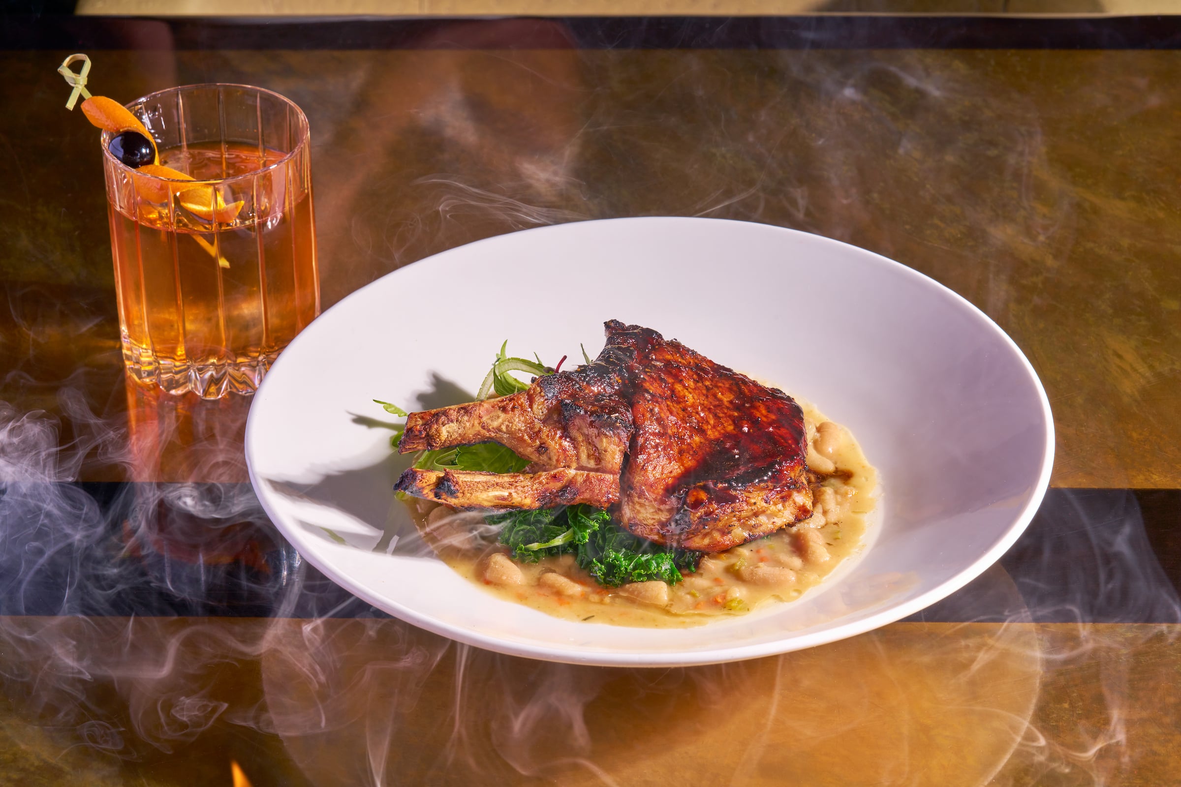 Plate of food & cocktail drink