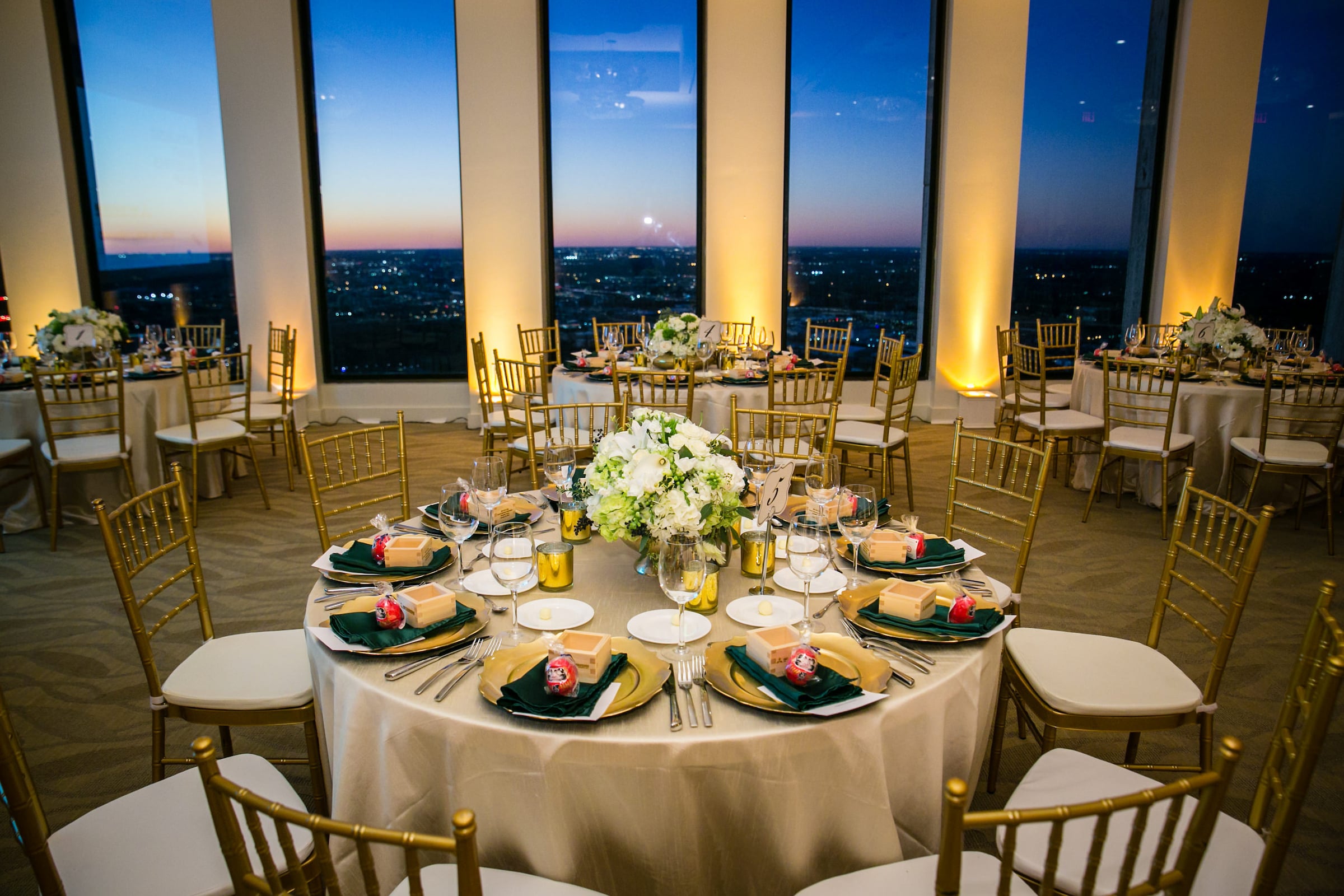 Private Event table set up with sunset seen through the windows at The Houston Club