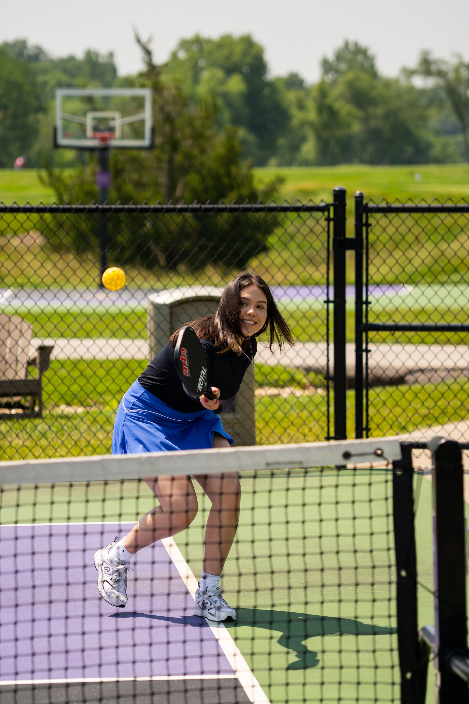 Girl playing pickleball