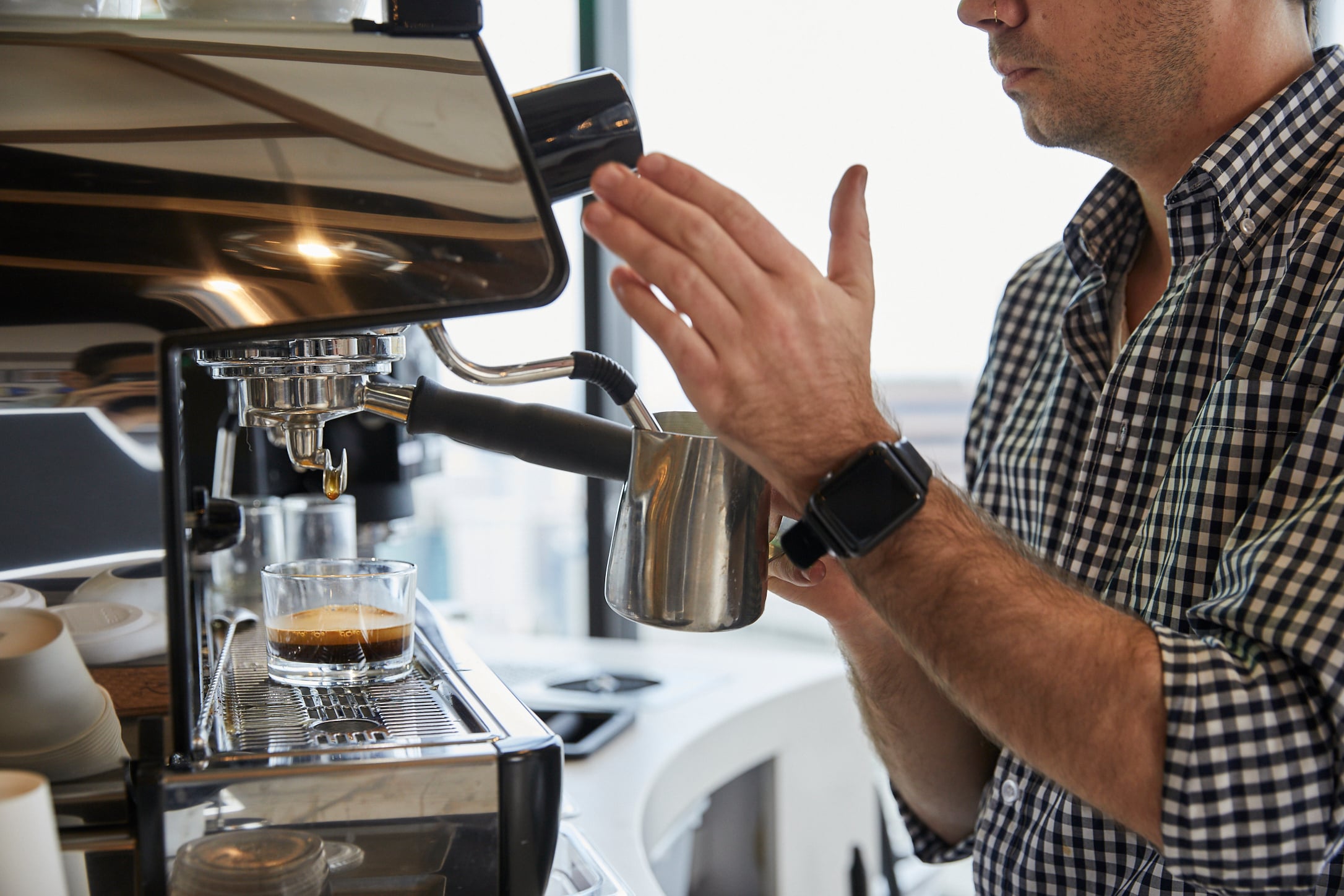 Barista creating a coffee drink