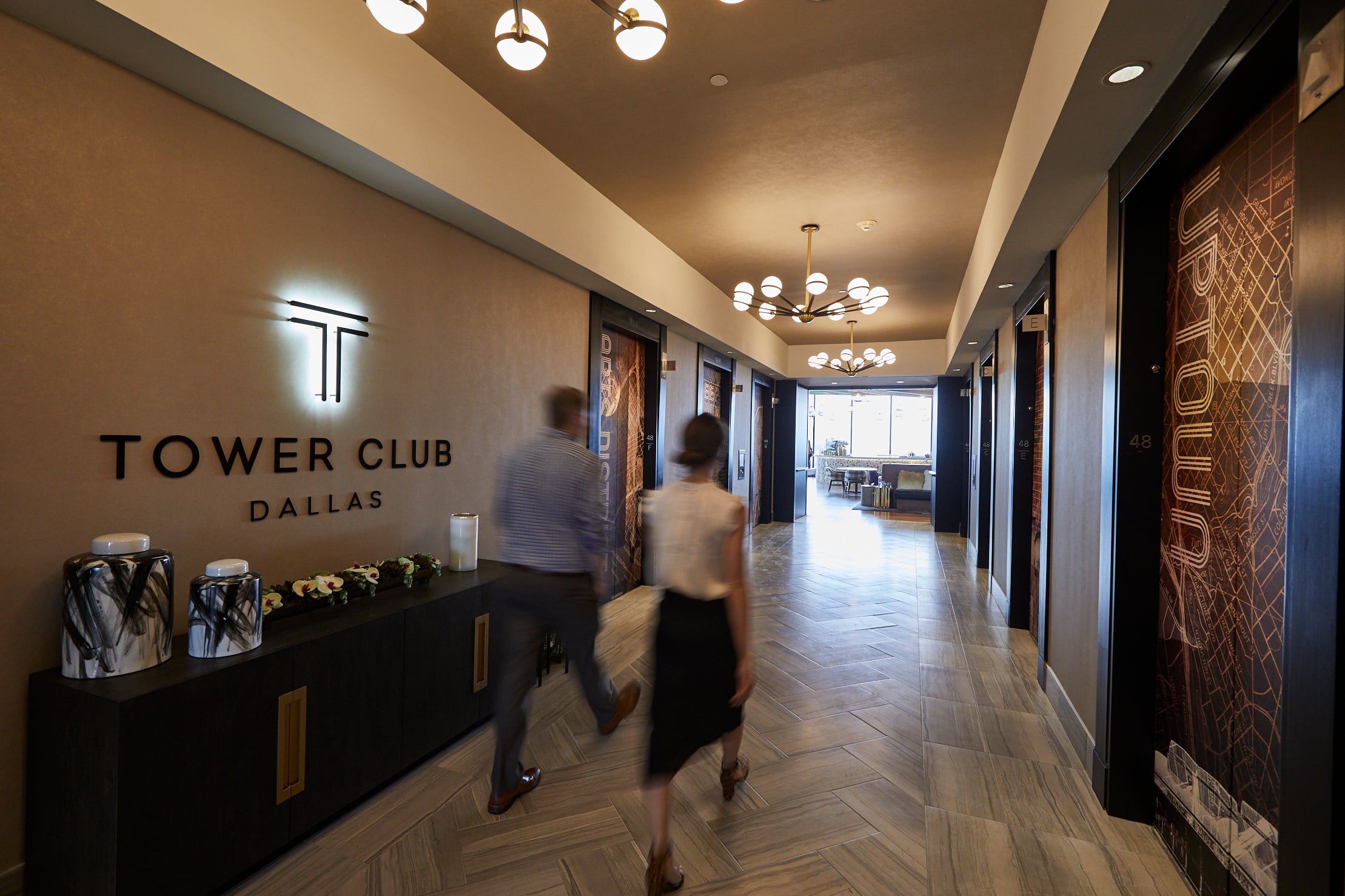 Tower Club Dallas Elevator Lobby with 2 people walking