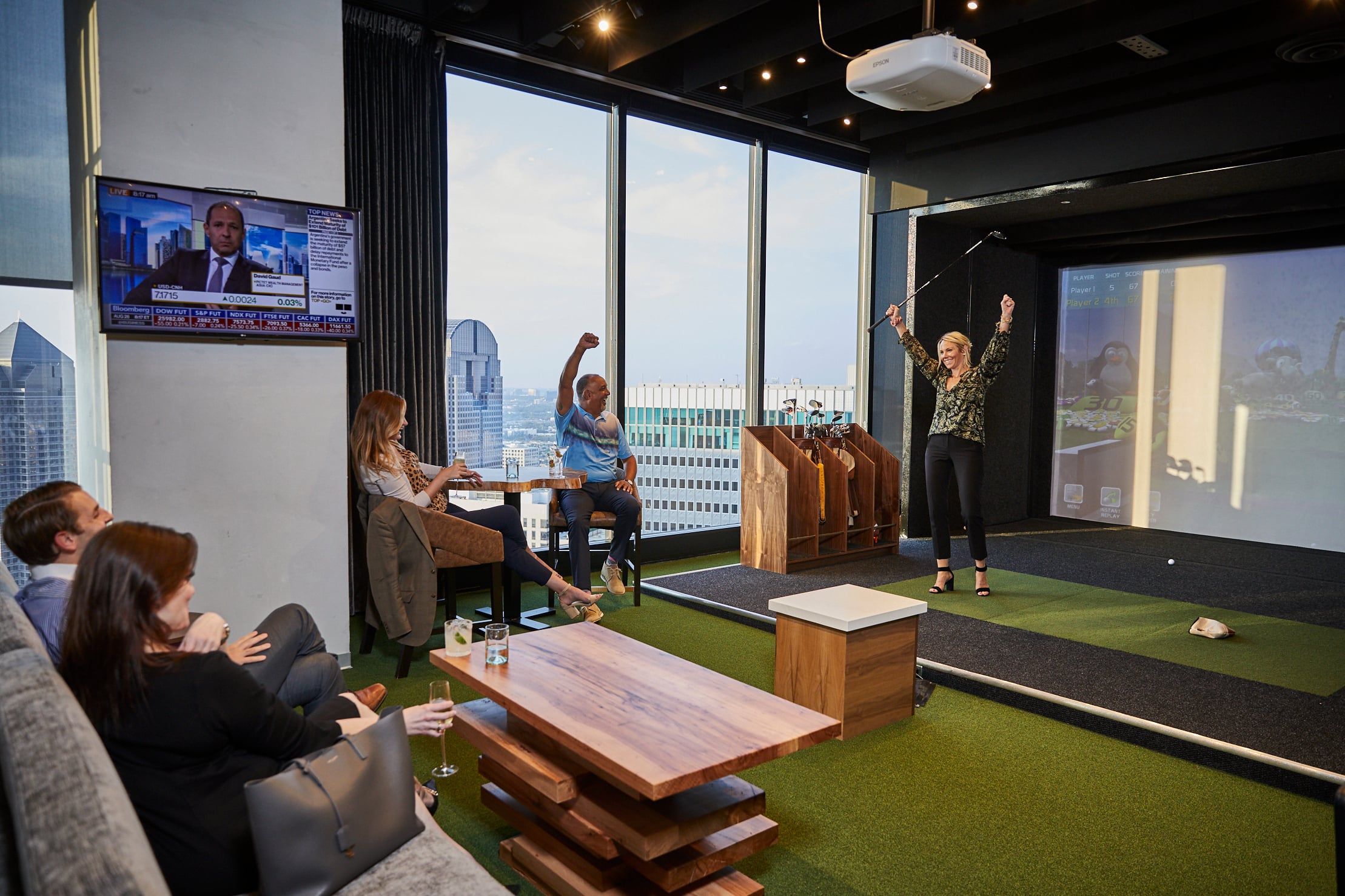 Golf Simulation Lounge with excited people
