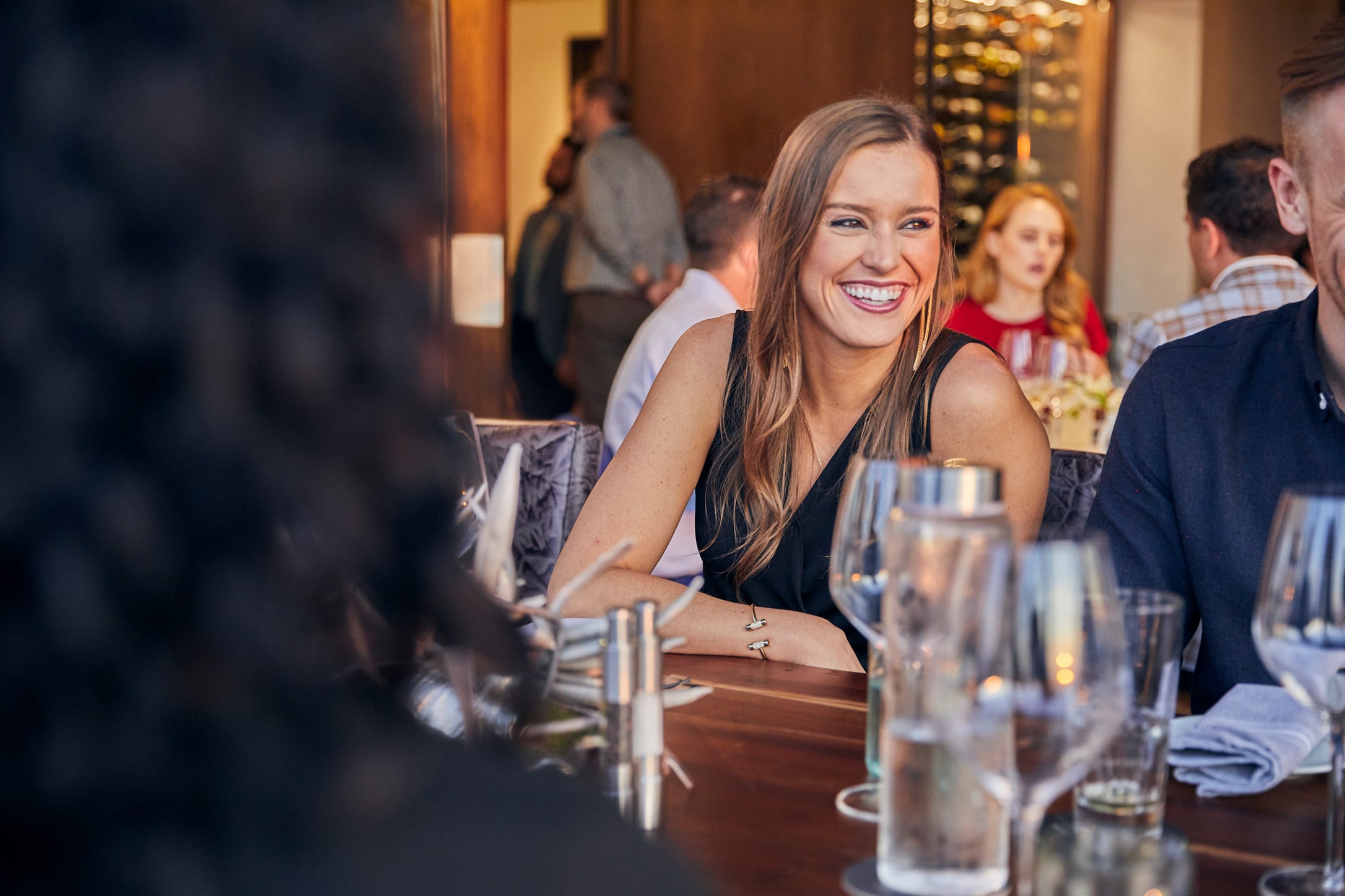 Woman dining at Tower Club Dallas