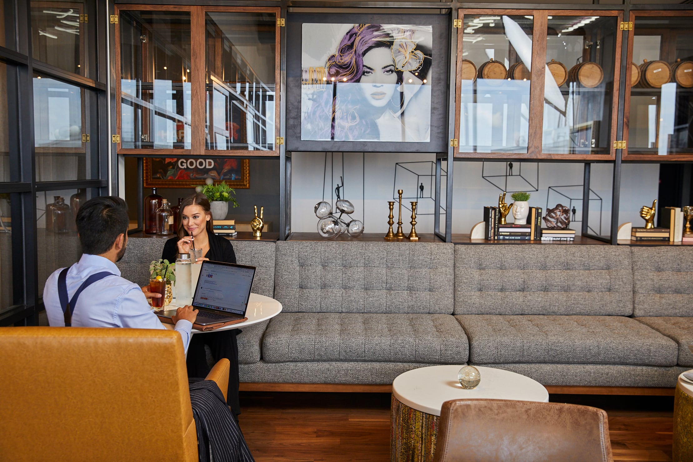 Man & Woman dining in the Tower Club Dallas Lounge area