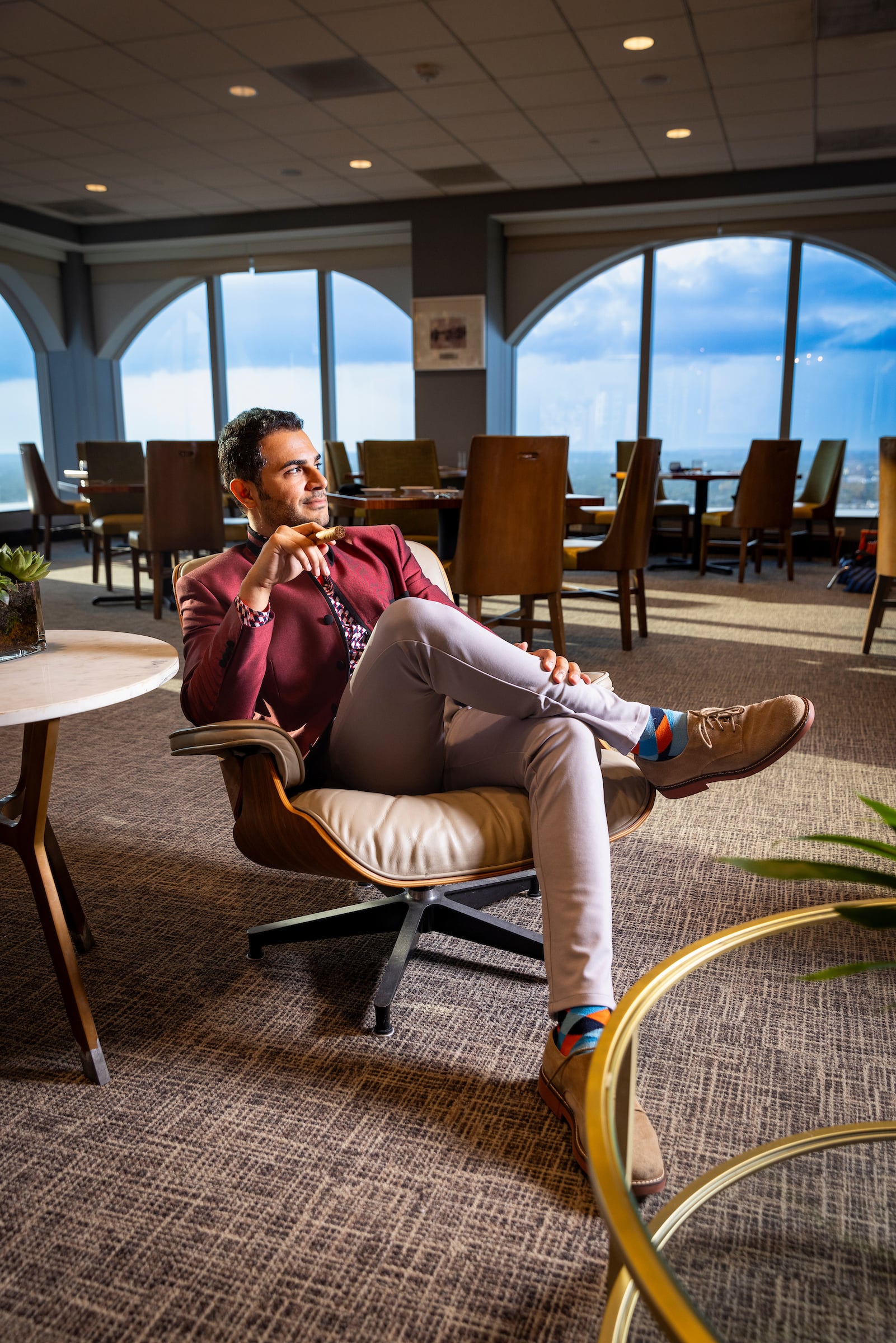 Man seated at Tower Club Ft Lauderdale