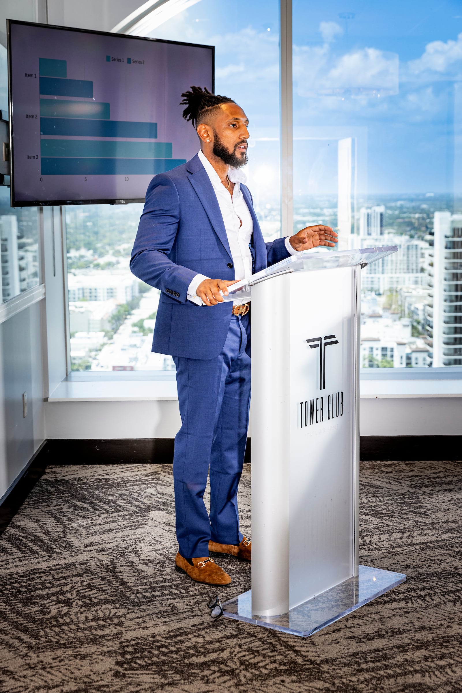 Man standing at a podium speaking