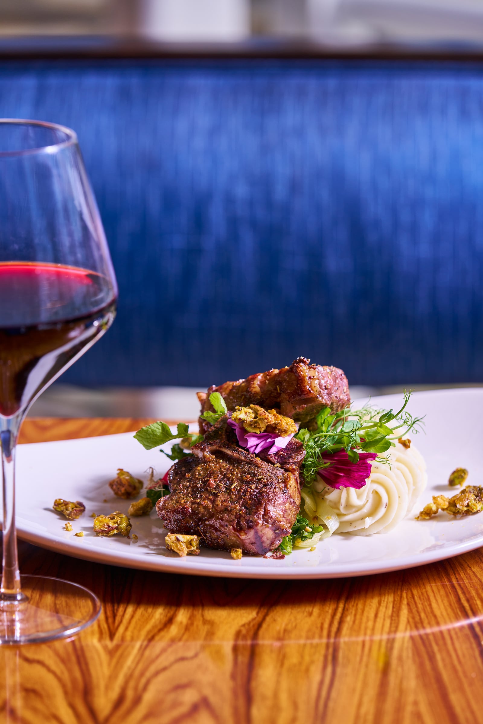 Glass of red wine & plate of food