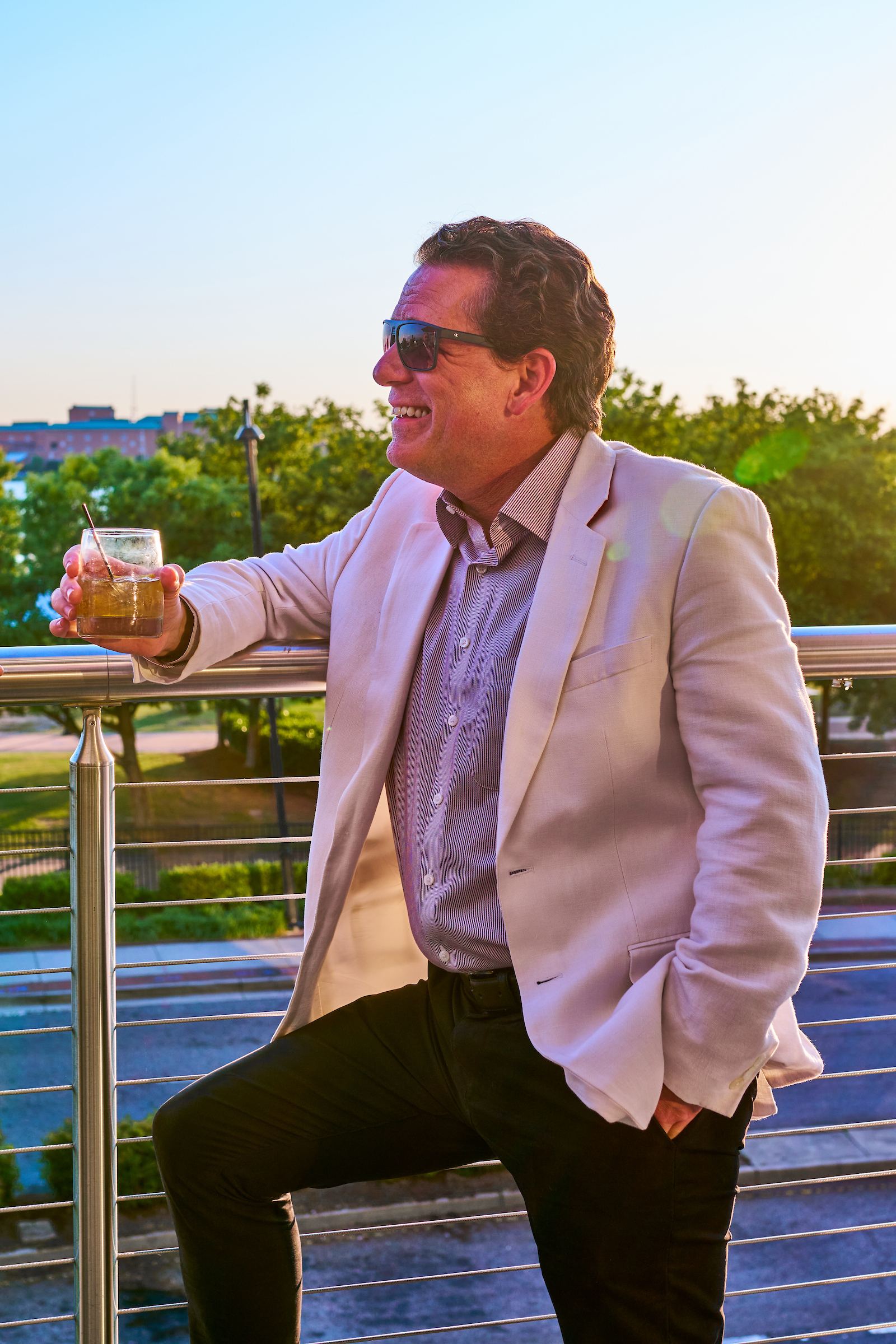 Man drinking on Town Point Club patio