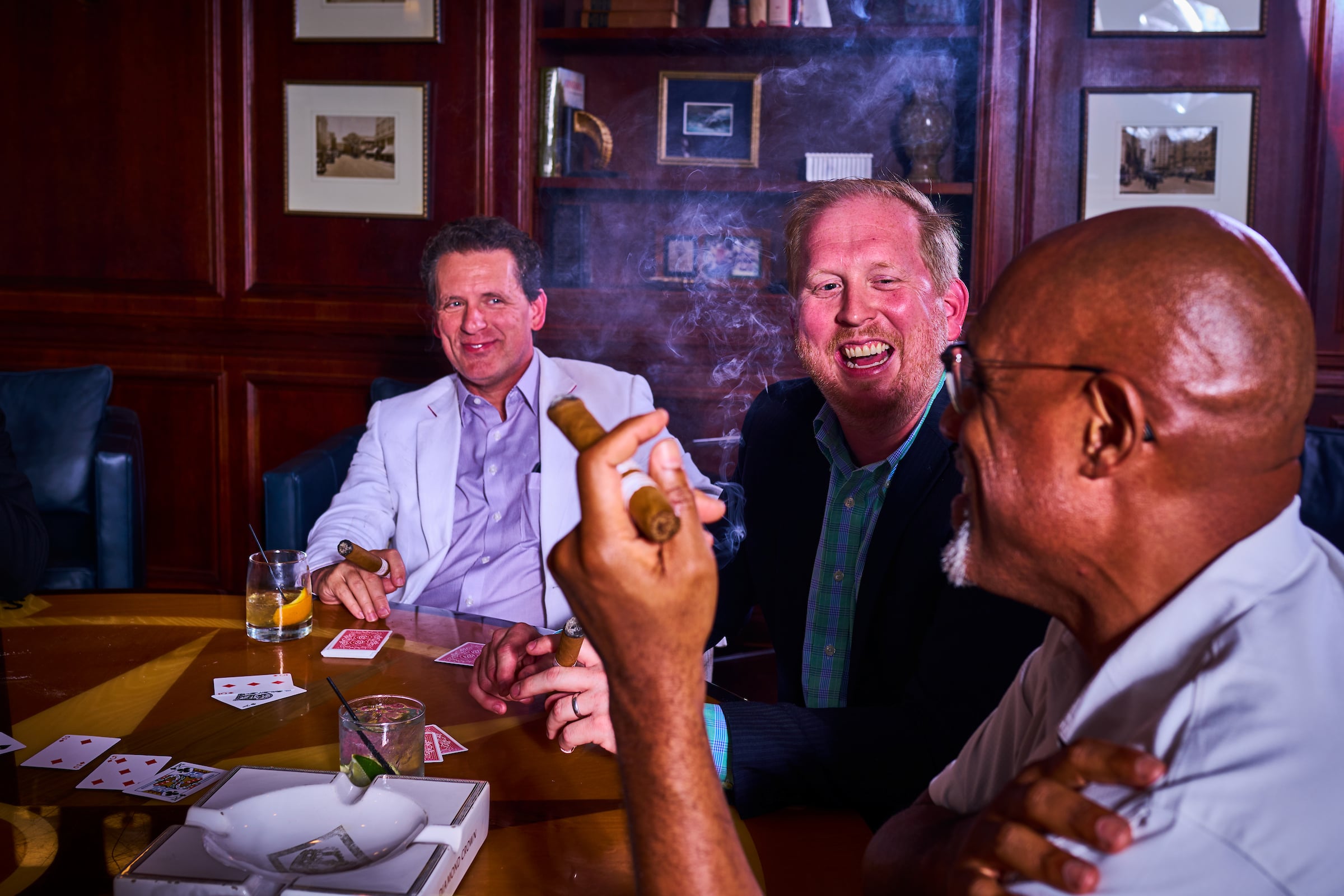 Three men smoking cigars, drinking & playing cards