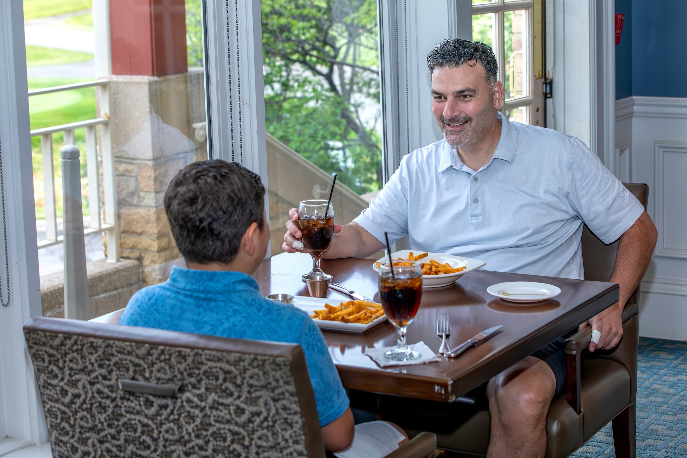 Father and son dining