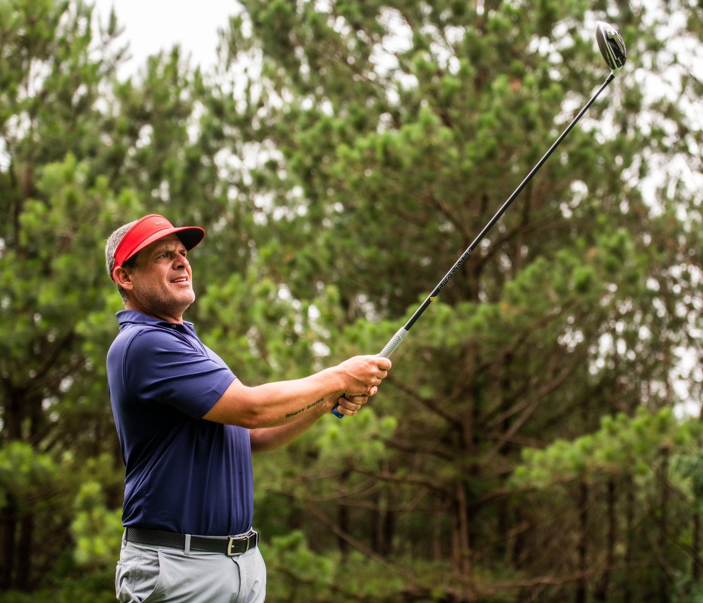 Man hitting a golf ball